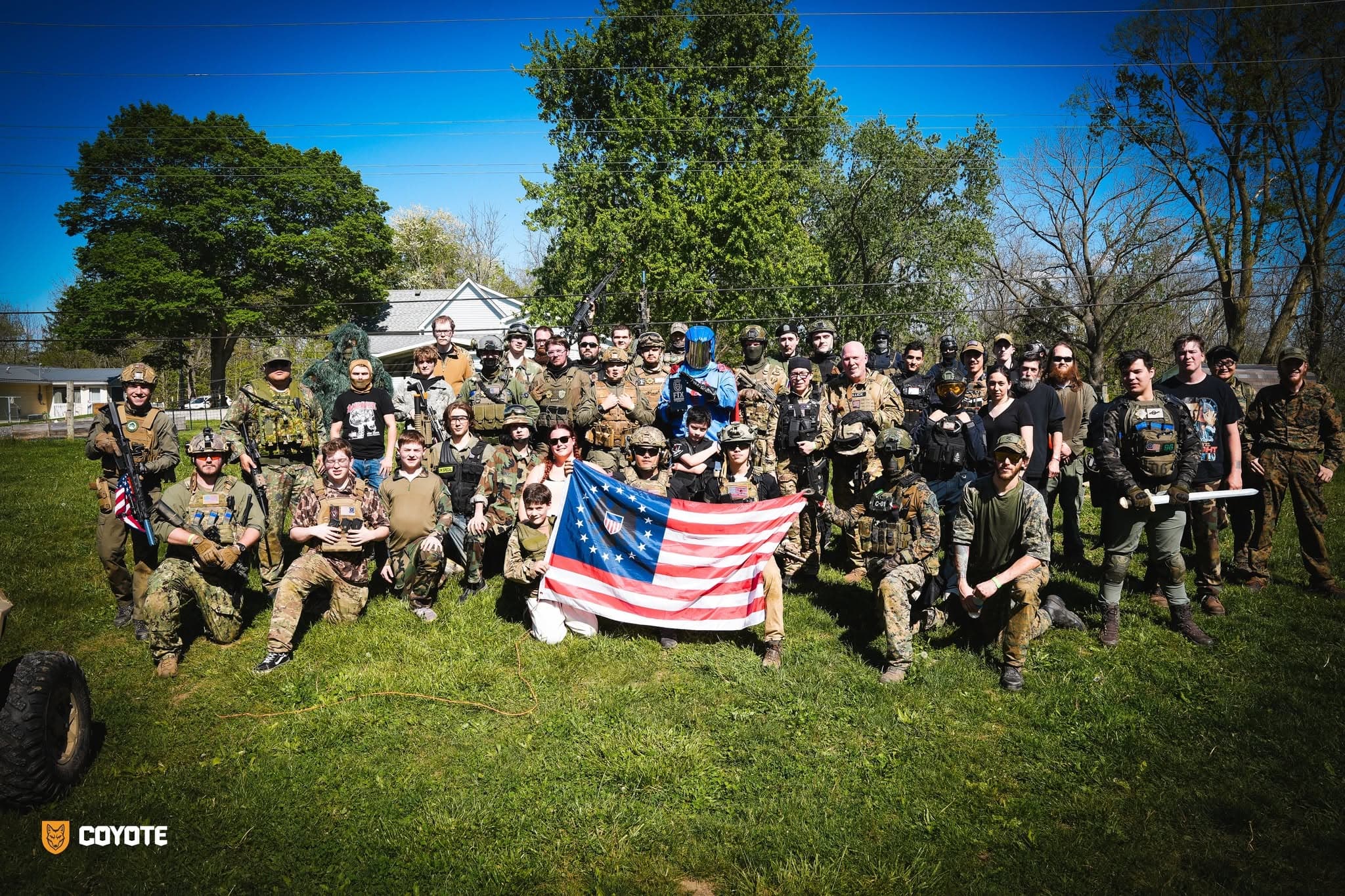 Coyote Force players with the field flag at Coyote Field in Ladoga, Indiana
