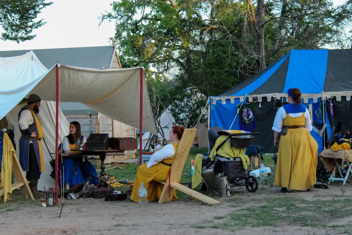 Yellow and blue pavilions at a daytime camp