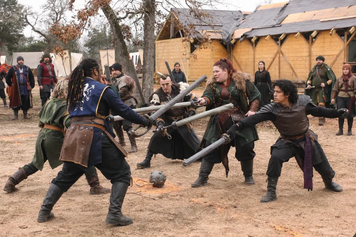 Boffer melee with crossed polearms on the battlefield